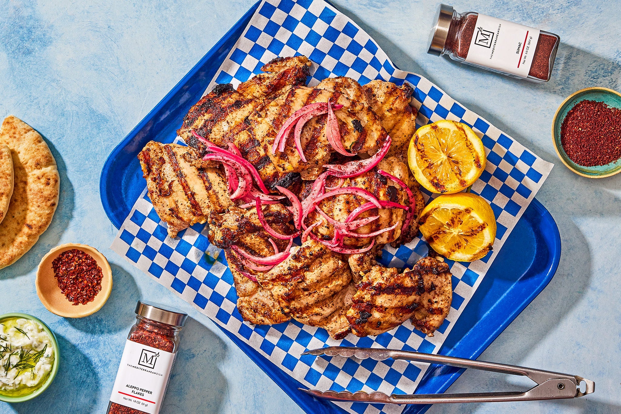 Grilled Chicken Thighs with Sumac, Pickled Onions, and Charred Lemon
 &ndash; The Mediterranean Dish