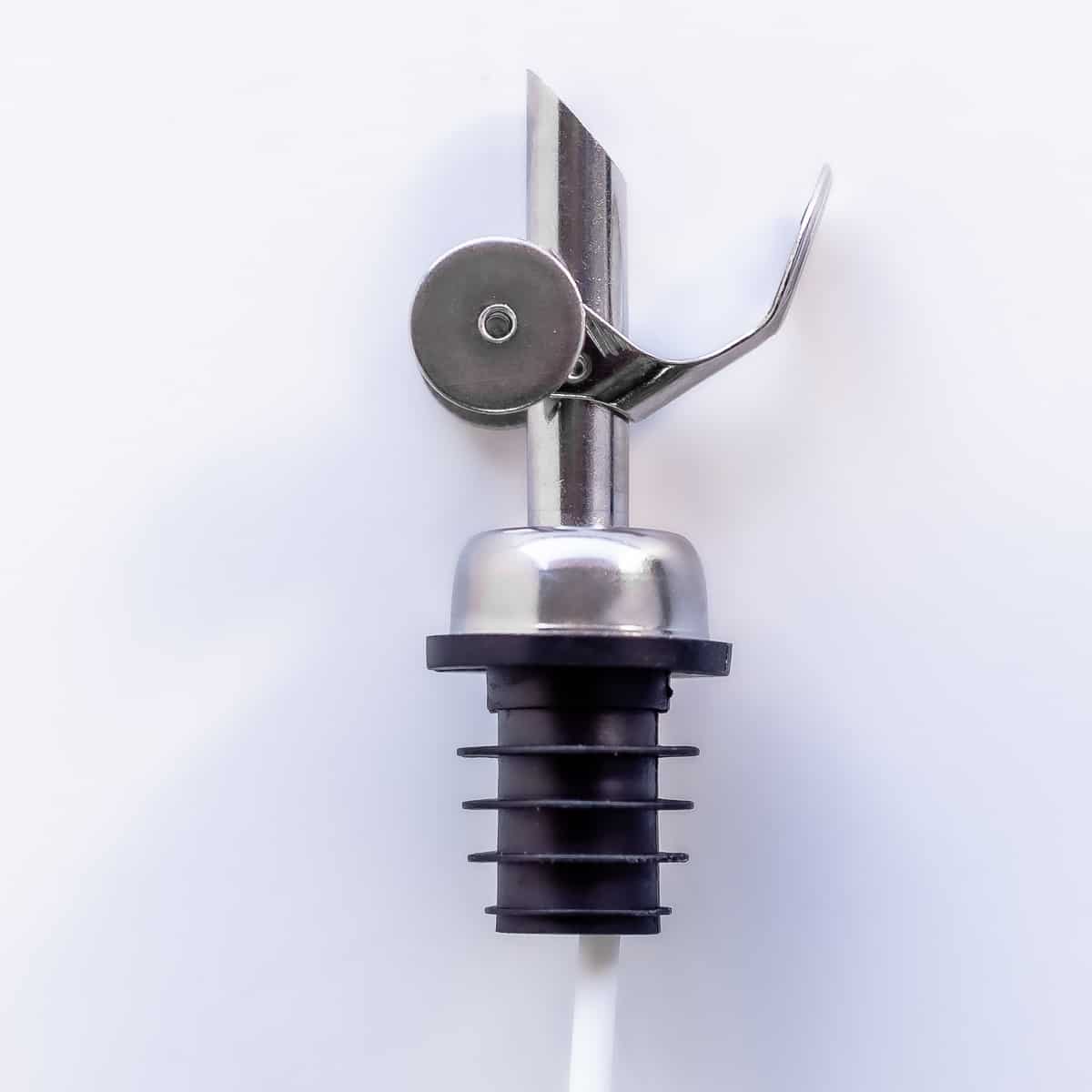 Olive oil pour spout with lid open - silver