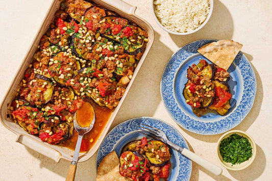 A close up of egyptian moussaka in a baking dish.