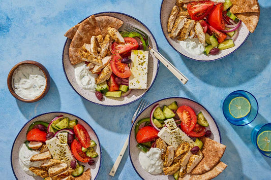 An overhead photo of a gyro bowl with a fork.