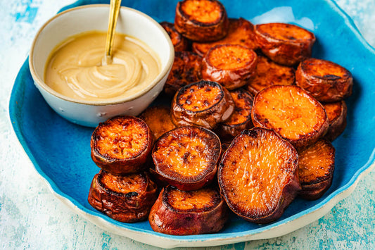 Oven Roasted Sweet Potatoes with Honey Tahini and Sesame Seeds
