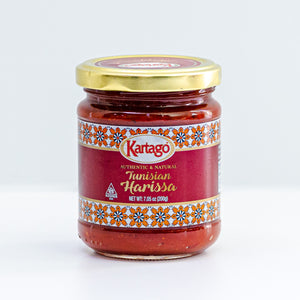 Jar of Kartago Tunisian Harissa on a white background.