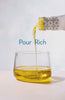 Video of The Mediterranean Dish olive oil pouring into a glass cup.
