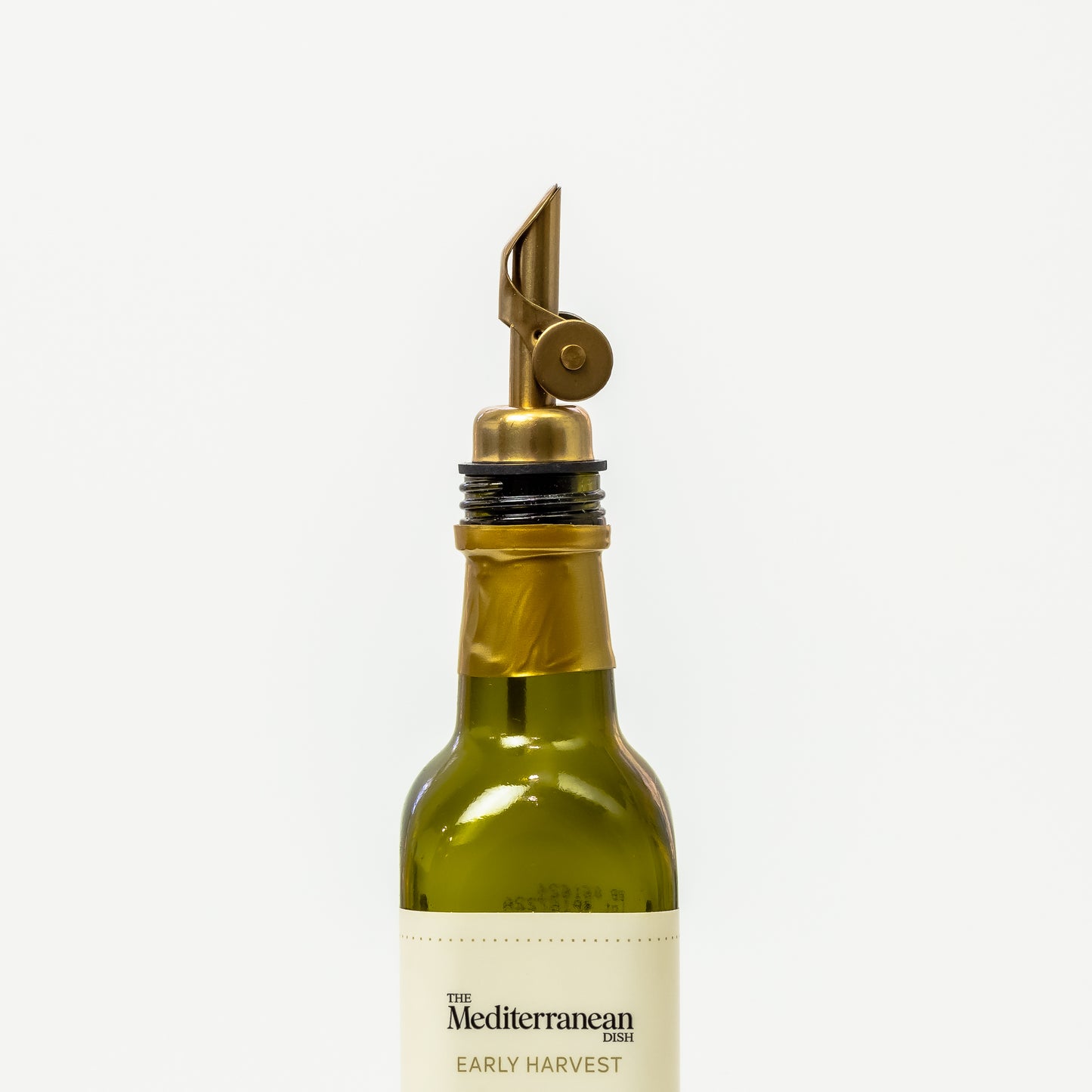 A premium olive oil pour spout - gold