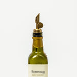 A premium olive oil pour spout - gold
